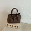 Bolso minimalista y único estilo coreano para madre e hija, nuevo bolso de mano de moda primavera-verano 2026, bolso tipo cubo para hombro y cruzado estilo coreano