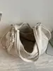 Mochila de viaje para commuting de gran capacidad, nuevo estilo verano 2026, bolso de hombro personalizado, bolso liso para mujer de alta apariencia