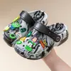 Zapatillas de verano para niños, sandalias al por mayor, zapatos de baño antideslizantes para niños y niñas con agujeros para bebés, bonitos dibujos animados para niños