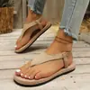 Sandalias tanga planas de talla grande 2026 verano nuevo ligeras comercio exterior europeo y americano correa elástica sandalias tanga planas para mujer