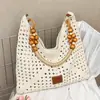 Bolso Tejido para Vacaciones en la Playa para Mujer 2026 Nuevo Estilo Bolso Tote de Punto Hueco Gran Capacidad Bolso de Hombro