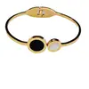 Nuevos Accesorios Femeninos Japoneses y Coreanos Pulsera de Titanio Negra y Blanca Redonda Bei Números Romanos Redonda Atmosférica Pulsera de Oro Rosa de 18 Quilates