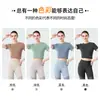 Ropa Personalizada Europea y Americana para Mujeres de Pilates y Yoga, Camisetas Deportivas de Secado Rápido, Tops de Manga Corta para Entrenamiento Fitness que Moldean la Cintura Fábrica