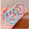 Nuevas diademas de alta gama 2026 para mujer, ligas de goma, cordones para el pelo, anillos para el pelo, cubiertas de cuero, accesorios para el pelo de niña con un toque de sofisticación