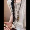 Collar Colgante de Flor con Cuerda de Cera y Cuentas de Madera Estilo Étnico Temperamento Retro Cadena para Clavícula Nicho Lujo Ligero Joyería de Gama Alta para Mujeres