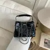Bolso Cubo de Nicho Estilo Coreano para Mujer 2026 Nueva Moda Bolso de Mano con Cadena Bolso Cruzado para Viajes Diarios Bolso de Hombro de Gran Capacidad