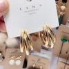Pendientes de mujer de metal sencillo estilo NIS, pendientes de aguja de plata S925 en forma de C, pendientes de temperamento frío, pendientes irregulares que combinan con todo.