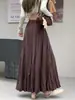Elegante saia plissada de cintura alta estilo retrô para mulheres, novo estilo para o início do outono de 2026, saia plissada de corte A que afina a silhueta e é estilosa, com barra larga
