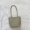 Cesta de verduras cubo de agua bolsa para mujer estilo nuevo 2026 verano tacto de alta gama textura tejida bolso de hombro único bolso tote de gran capacidad