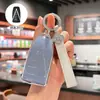 Adecuado para el estuche de llave de control remoto para automóviles Dongfeng Venucia V, VX6 y VDDi, una carcasa protectora de alta gama con una hebilla decorativa