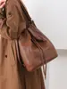 Mochila Casual Retro de Nuevo Estilo para Mujer con un Elegante Diseño de Cordón, Sensación Relajada, Bolsa de Gran Capacidad para el Día a Día para Mujeres