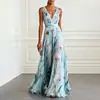 Elegante vestido con estampado de plantas para mujer, nuevo estilo de otoño, ropa para mujer de comercio exterior europeo y americano, falda larga con escote en V profundo que ciñe la cintura