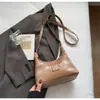 Bolsa Pequena Moderna Retro de Luxo para Mulheres Verão e Inverno Nova Moda 2026 Bolsa Transversal de Ombro Único Sob o Braço Bolsa Bolinho