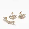 Pendientes de Botón con Pedrería Transfronterizos Europeos y Americanos Nuevo Producto Aleación Estilo Fresco Personalidad Sentido del Diseño Clip para Cartílago del Oído Sin Perforación en la Oreja Joyería para Mujer