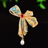 Broche de Laço Elegante Retro Francês Acessórios de Corsage Versáteis Elegantes Design de Nicho Roupas de Alta Qualidade