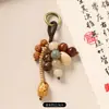 Nuevo colgante de bolsa de cuentas de semillas que cumple deseos estilo chino, llavero de Bodhi natural tejido a mano, decoración artística retro para bolsa