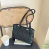 Bolsa de palha trançada vazada de verão para mulheres 2026 nova tendência moderna bolsa tote grande capacidade bolsa de ombro único para o dia a dia