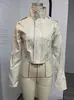 Bestseller de AliExpress al por mayor 2026 Nueva moda para mujer Chaqueta de cuero PU estilo espina de pescado ajustada europea y americana con cuello alto