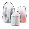 Bolsas con cordón esmerilado al por mayor, plásticas engrosadas portátiles para viaje transparentes a prueba de polvo e impermeables para almacenamiento de ropa