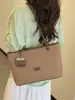 Yaozi 2026 outono inicial nova moda casual simples bolsa de ombro tipo sacola de balde de grande capacidade, bolsa de ombro versátil para o trabalho