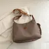 Bolsa de tela de moda casual 2025 Verano Nuevo Bolso Tote de Gran Capacidad Simple Bolso de Hombro Cruzado Bolso Ligero Versátil