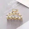 Pinza Pequeña Geométrica Hueca de Perlas y Pedrería, Textura Dulce y Femenina Estilo Francés, Accesorio para el Cabello de Nicho de Lujo Ligero Popular en Internet Venta al por Mayor