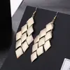 Moda Transfronteriza Europea y Americana, Varios Pendientes Largos Metálicos de Borla Exagerada de Estilo Moderno con Elementos Populares, Venta al por Mayor