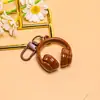 Nuevo llavero creativo de auriculares 3D, un accesorio moderno y genial para bolsos, joyería hecha a mano para manualidades y materiales para accesorios, al por mayor
