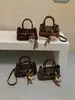 2026 Nova Bolsa Boston de Camurça Retrô para Mulheres de Alto Padrão Nicho Versátil Ombro de Mão Moda Bolsa Transversal