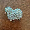 Broche Retro Europeo y Americano Simple de Oveja Pequeña con Perla Broche Lindo Estilo Animal Accesorios de Pines para Ropa Venta al por Mayor