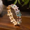 Pulseira Elástica Borboleta Irregular Esmaltada Novo Estilo Transfronteiriça para Mulheres, Pulseira de Liga de Alumínio Borboleta Vazada Fashionável e Versátil