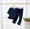 Pijama de verano para niños suelto para niños y niñas niños mayores ropa de casa fina casual de manga corta pantalones traje de dos piezas de modal