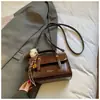 Bolso de Mujer a la Moda Estilo Británico 2026 Nuevo Modelo, Bolso de Hombro Versátil con un Aspecto Sencillo y de Gama Alta, Bolso de Mano y Bolso Cruzado de Moda