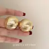Brincos Redondos Exagerados com Tachas em Metal Escovado Minimalista de Alta Qualidade Tendência Ins Estilo Retro de Hong Kong Venda por Atacado