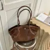 Bolso de Mano Elegante Tejido Texturizado Estilo Coreano Retro 2026 Verano Nuevo Gran Capacidad Casual para el Trabajo Bolso de Hombro Único