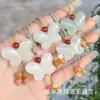 Colgante de Mariposa y Loto de Jade Verde Tianshan de Xinjiang Jade Natural para Hombres y Mujeres Estilo Chino Cadena para Suéter Colgante Venta al por Mayor
