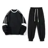 Conjunto de Jogger para Hombre Pantalones Cropped Versátil Holgado Conjunto de Dos Piezas Pantalones Largos Sudadera Sudadera de Cuello Redondo Casual Deportivo Negro Grafito