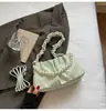Bolso de Mujer de Nicho Estilo Francés 2025 Nuevo Bolso Plegado Versátil Bolso Cruzado con Cadena Bolso de Hombro de Moda