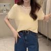 Suéter Feminino Verão 2025 Casual Retrô Francês de Alta Qualidade Elegante com Gola Redonda Design Vazado Manga Curta