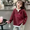 Blusa feminina estilo coreano com trama waffle, falsa peça dupla, manga longa, nova para primavera/outono, versátil e estilosa, de caimento solto, para crianças mais velhas