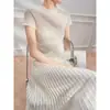 Nuevo Estilo Primavera y Verano 2026 Tejido de Punto Fino Ligeramente Transparente Camiseta Interior Casual Camisa con Borde Enrollado Protección Solar Top para Mujer