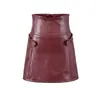 Minissaia Sexy Ultra-Curta para Garota Popular Novo Estilo Primavera e Verão 2026 Cintura Alta Antiexposição Saia Evasê Saia de Couro PU Preta