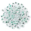 Paquete de 100 cuentas acrílicas con alfabeto oblatas, de color transparente, para manualidades.
