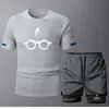 2025 Novo Conjunto Esportivo Fitness Casual de Verão Respirável de Secagem Rápida Peça Dupla Masculino Tendência Gola Redonda Manga Curta