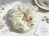 Goma para coleta floral muy elegante de estilo coreano, versátil y elegante. Suministro para tienda de accesorios, directo de la fábrica fuente