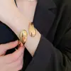 Pulseira Aberta Gota d'Água Simples Transfronteiriça Europeia e Americana Moda Retrô Design de Nicho Pulseira Joia de Luxo Leve de Alta Qualidade para Mulheres