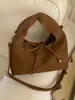 Retrô, fashion, minimalista e luxuosa - uma bolsa de ombro, bolsa de mão ou bolsa transversal versátil para o dia a dia, perfeita para a temporada de outono de 2026, com um design único