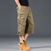 Monos de verano finos y holgados de talla grande para hombre, pantalones multibolsillos, pantalones capri informales para exteriores, pantalones cortos de verano para hombre.