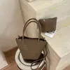 Bolso Shuai Mi Jia, color liso, elegante, nuevo modelo 2026, bolso de hombro casual, bolso de axila de moda, bolso cubo tejido para el día a día