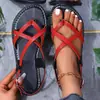 Sandalias de playa transfronterizas para mujer talla grande 2026 nuevo modelo de comercio exterior con tiras cruzadas y hebilla, chanclas planas ligeras para mujer